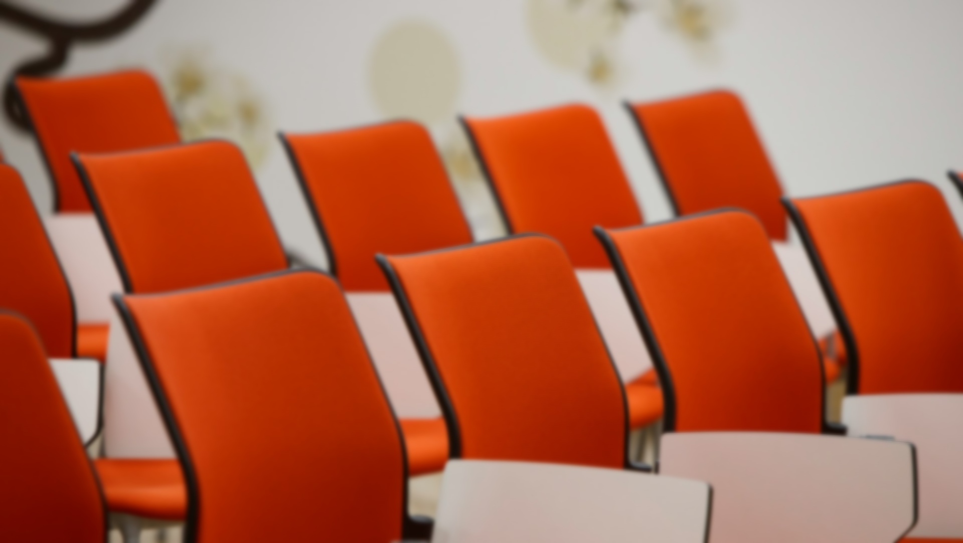 orange chairs in white room