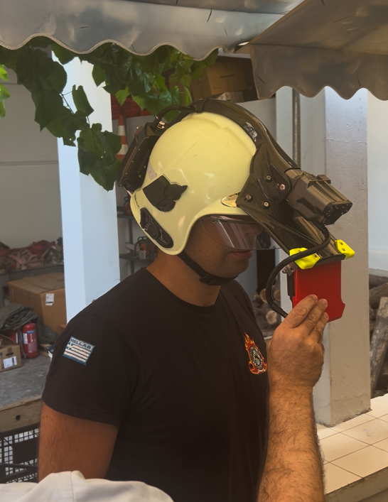 A firefighter from Athens trying on the iFalconHM system A firefighter from Athens trying on the iFalconHM system